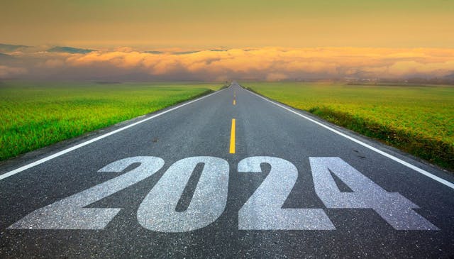 2024 written on road looking onto the horizon
