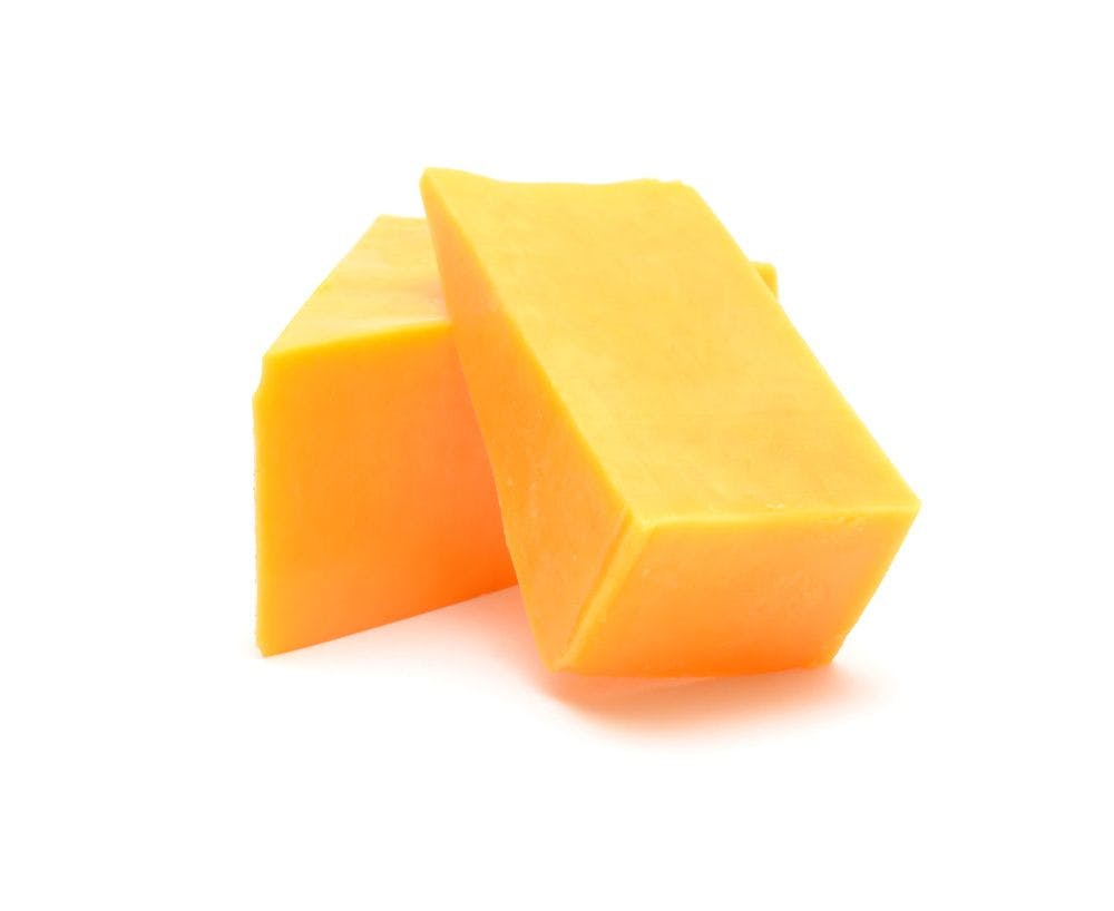 Photo of traditional cheddar cheese from © AdobeStock.com/annguyen