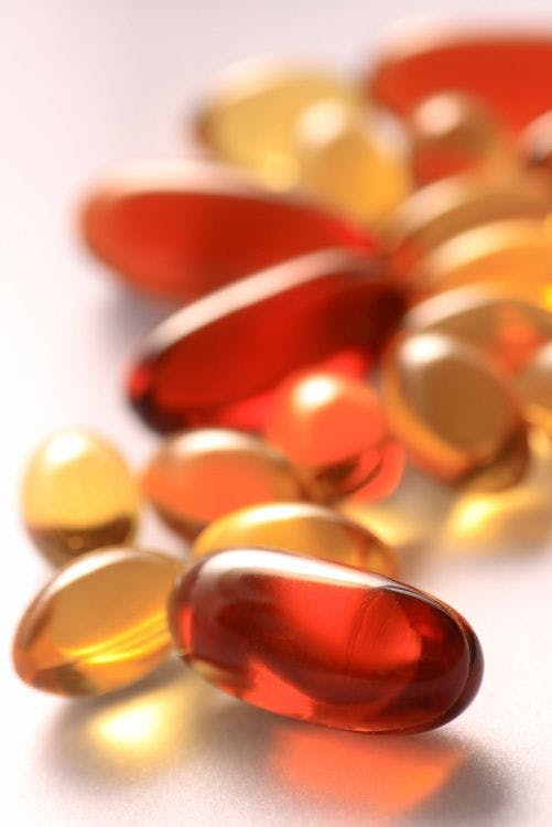 red and yellow soft gel capsules