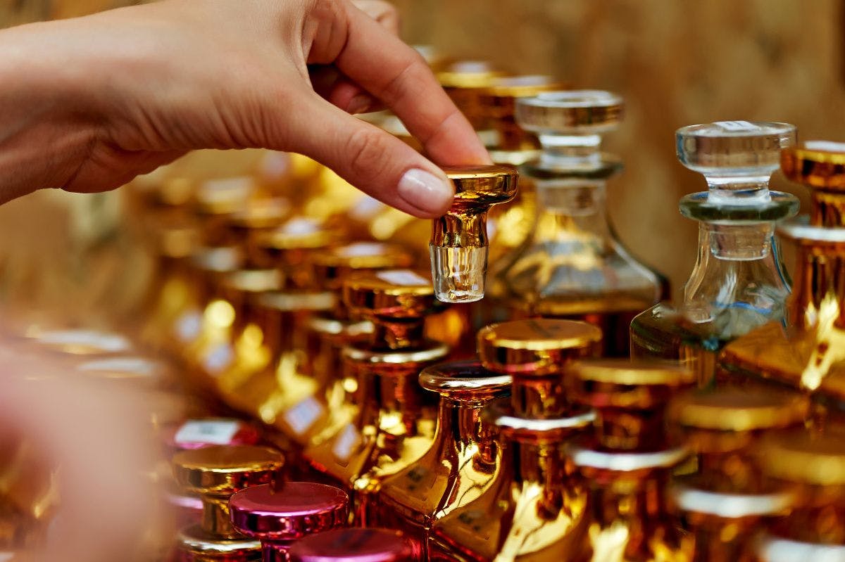 rows of glass perfume bottles